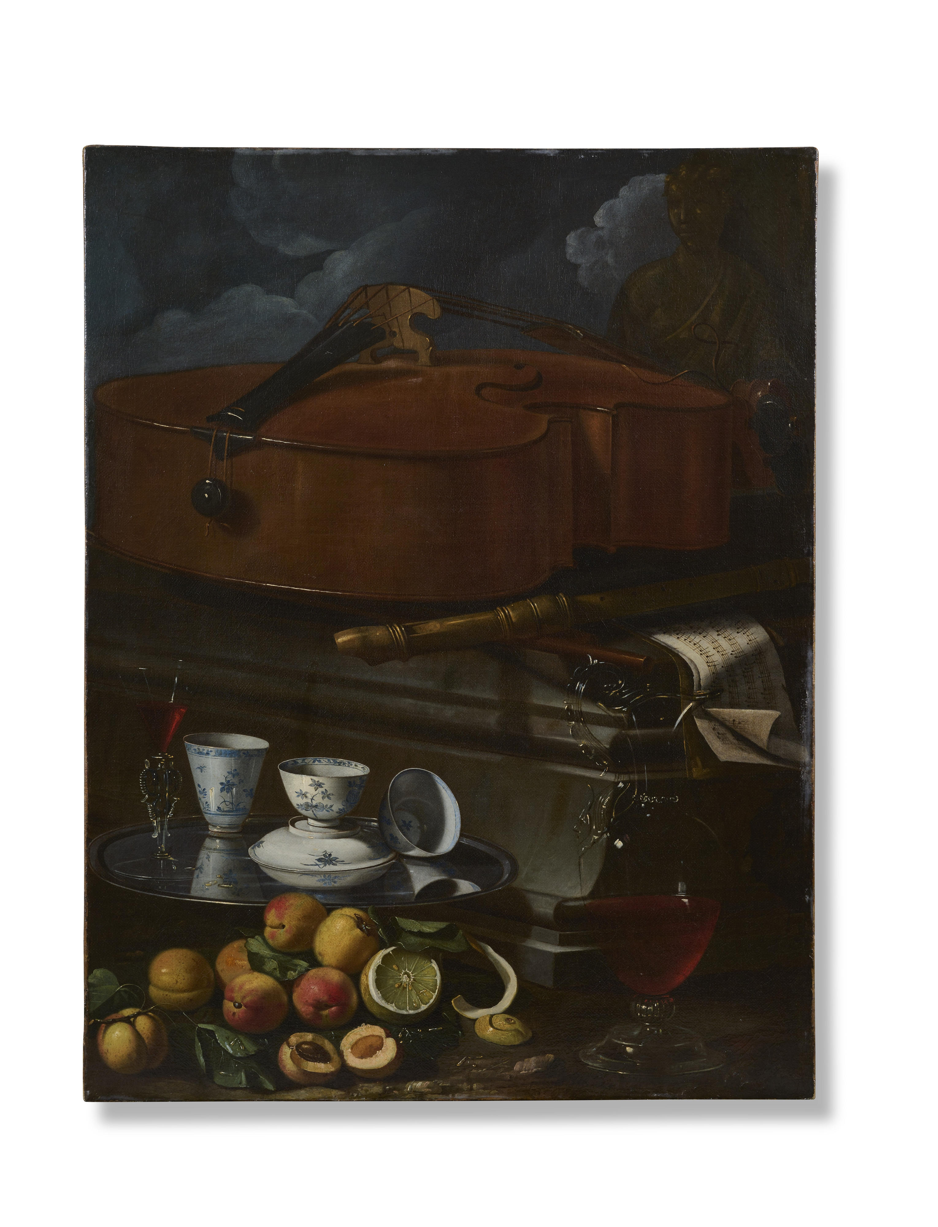 Still Life with Porcelain Cups and a Façon de Venise Glass on a Salver, with a Ewer of Wine, a Peeled Lemon, Peaches and other Fruit, all before a Plinth with a Cello, a Recorder and Scores of Music